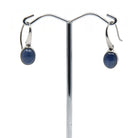 sapphire (blue) cabochon oval earrings with silver setting on white background — Eternal Spirit