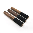 Black singing bowl striker, felt head detail close-up — Eternal Spirit