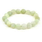 polished Jade (New) tumbled round bead bracelet on white background — Eternal Spirit