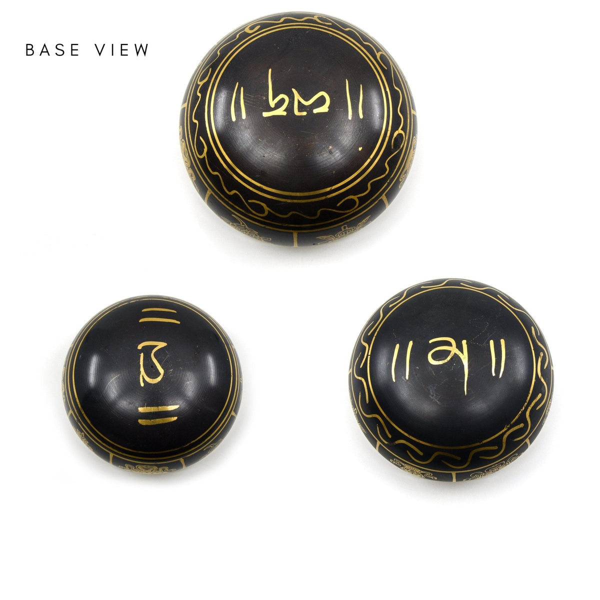 upturned 15cm Black & Gold Auspicious NIM11C Crown chakra bowl, ornately patterned base revealed — Eternal Spirit