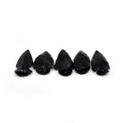 glossy black Obsidian arrowheads, close-up of natural texture — Eternal Spirit