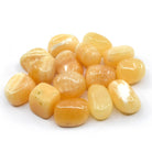 collection of polished Aragonite (Orange) tumble stones — Eternal Spirit