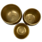 Yellow Hammered Madal Base chakra bowl (13.5cm) from a second angle — Eternal Spirit
