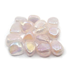 collection of polished Quartz (Rose Aura) tumble stones — Eternal Spirit