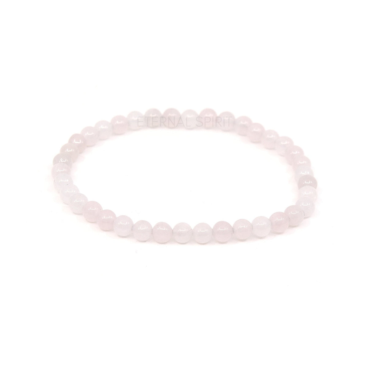 polished Quartz (Rose) 4mm round bead bracelet on white background — Eternal Spirit