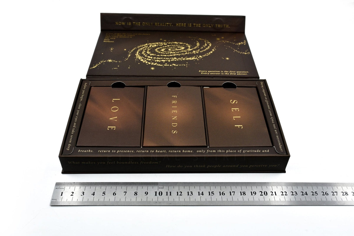 Spread of black sacred connection cards with golden symbolic artwork — Eternal Spirit
