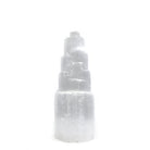 luminous white Selenite crystal lamp (S), glowing from within — Eternal Spirit