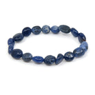 polished Sodalite tumbled round bead bracelet on white background — Eternal Spirit