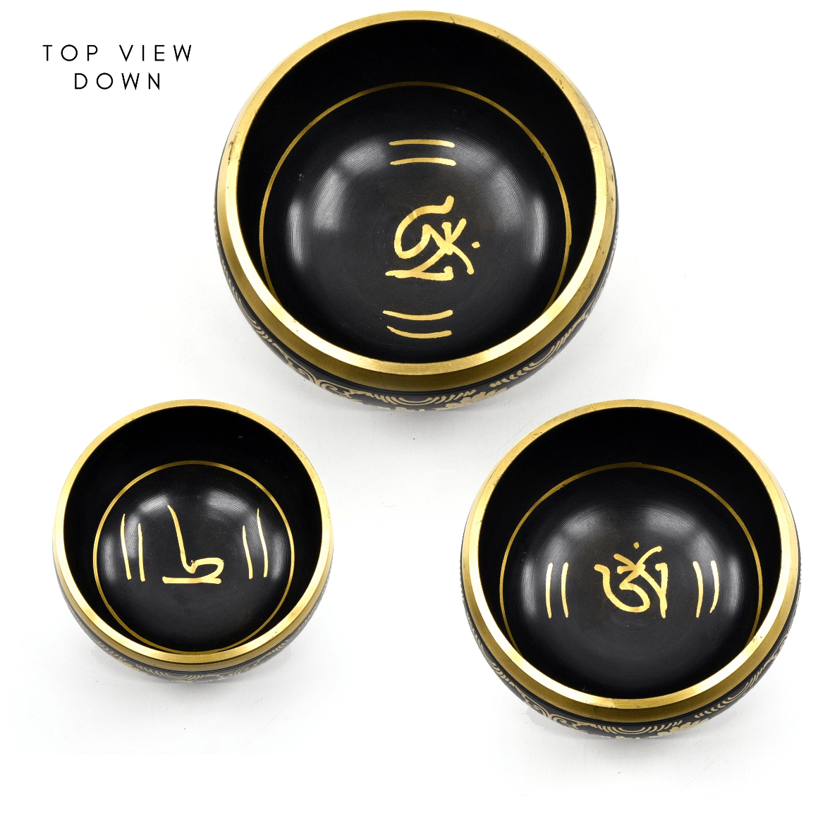 gazing down into the 14.5cm Black & Gold Om Mani Third Eye chakra singing bowl — Eternal Spirit