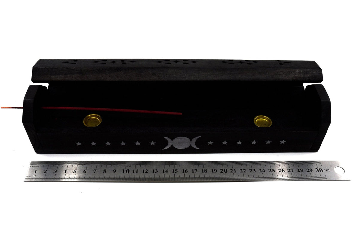 Black wooden incense box, overhead of ornate lid — Eternal Spirit