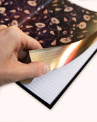 Dreamy Moons diary, hand turning gilded page edges to the lined pages inside — Eternal Spirit
