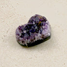 Amethyst crystal heart 7.5cm, dark purple crystals fading to clear, angled view — Eternal Spirit