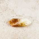 Heated citrine crystal wand 9cm, half amber and half milky white, double-pointed, side view — Eternal Spirit