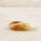 Heated citrine crystal wand 9cm, amber body with frosted white tips, low side view — Eternal Spirit