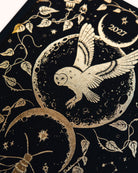 Dreamy Moons diary, close view of the Onyx Black cover's gold foil owl, moons and vines — Eternal Spirit