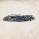 Blue kyanite natural crystal blade 11cm, grey-blue layered blades, lying flat — Eternal Spirit