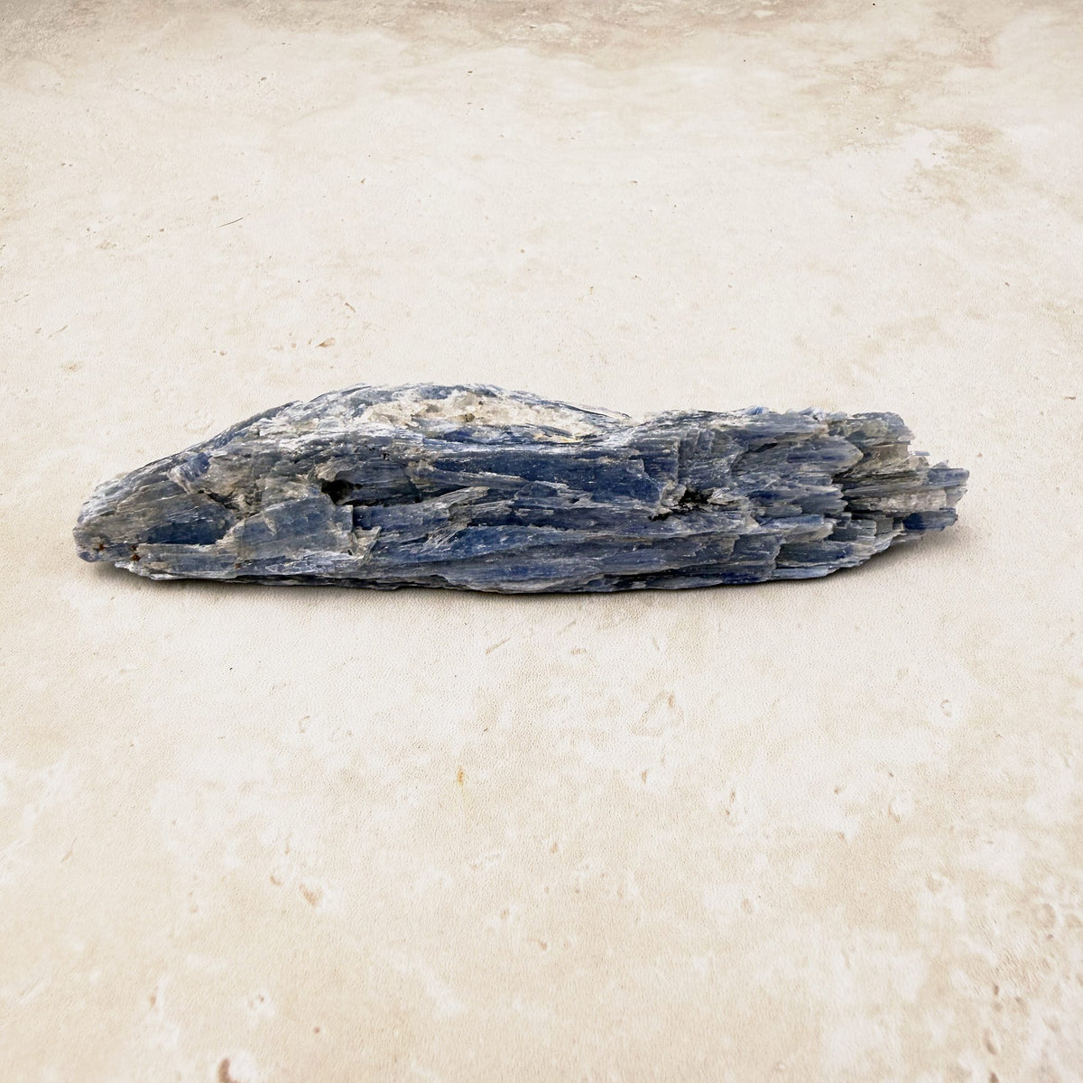 Blue kyanite natural crystal blade 11cm, grey-blue layered blades, lying flat — Eternal Spirit