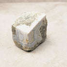 Blue lace agate rough crystal 5cm, soft blue banding on a chunky rough piece, angled view — Eternal Spirit
