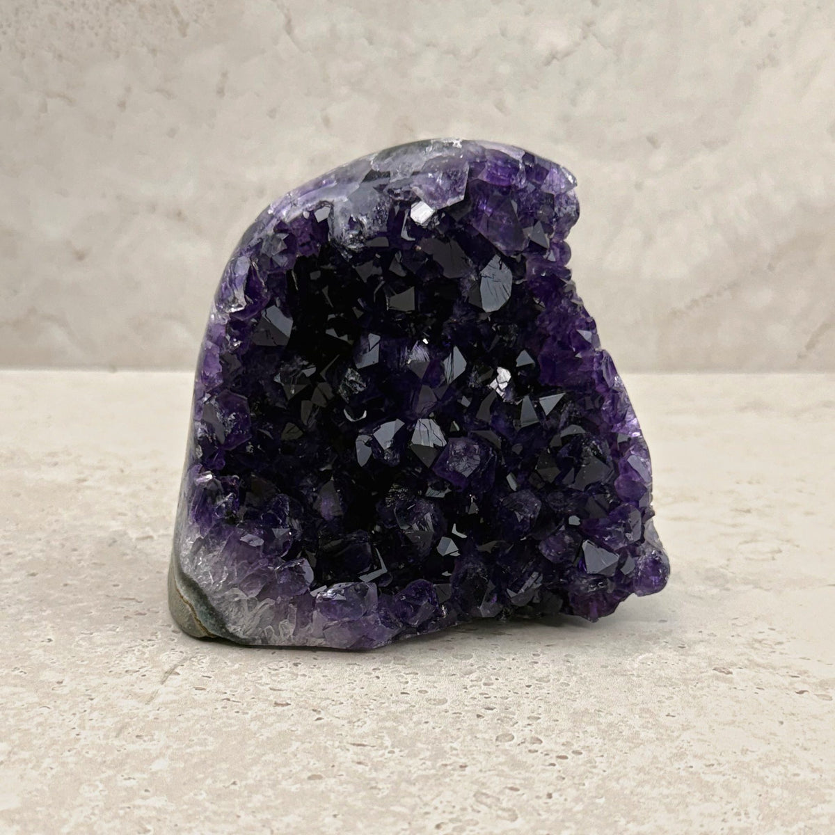 Base cut amethyst crystal 11cm, wide rounded face of deep purple crystals, front view — Eternal Spirit