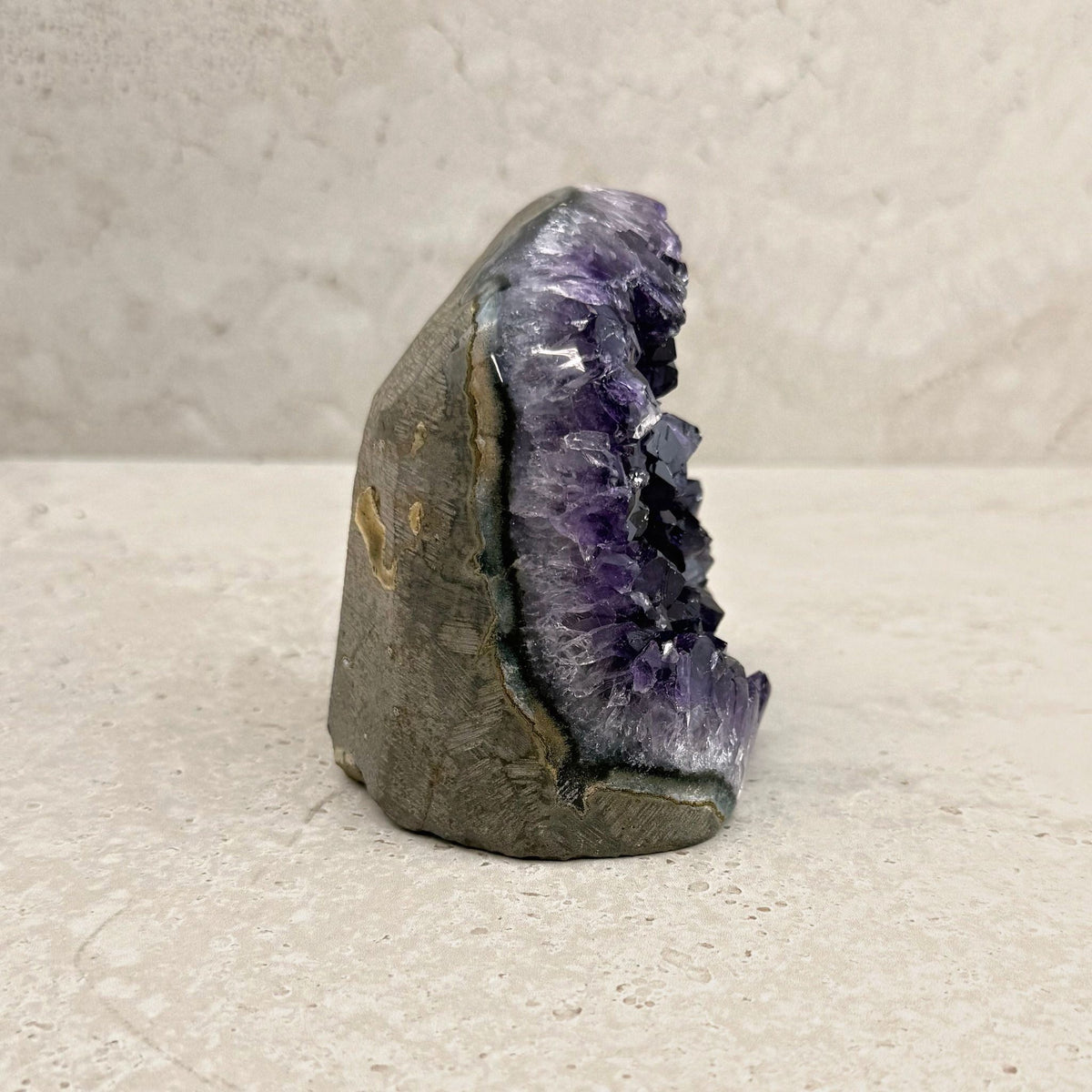 Base cut amethyst crystal 11cm, white crystal rim, side view — Eternal Spirit