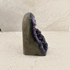 Base cut amethyst crystal 17.5cm, layered grey shell, side view — Eternal Spirit
