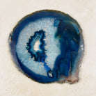 Dyed blue agate crystal slice 16cm, blue bands with a small crystal pocket, viewed from above — Eternal Spirit