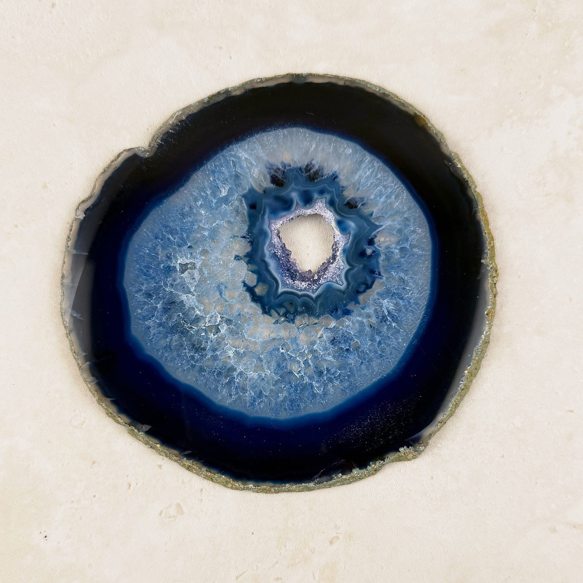 Dyed blue agate crystal slice 11.5cm, pale blue crystal centre in dark blue rings, from above — Eternal Spirit