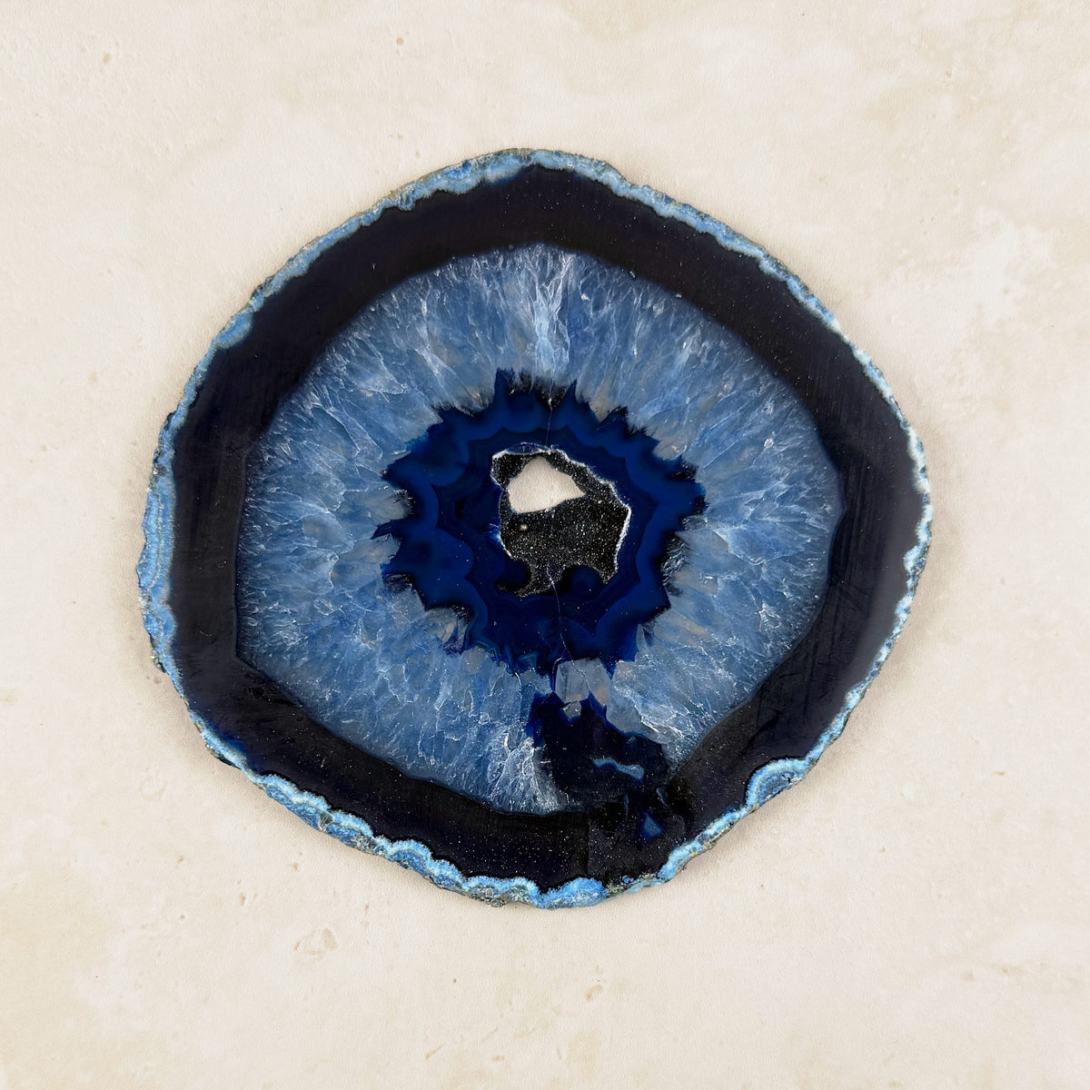 Dyed blue agate crystal slice 12cm, blue crystal centre with dark blue bands, viewed from above — Eternal Spirit