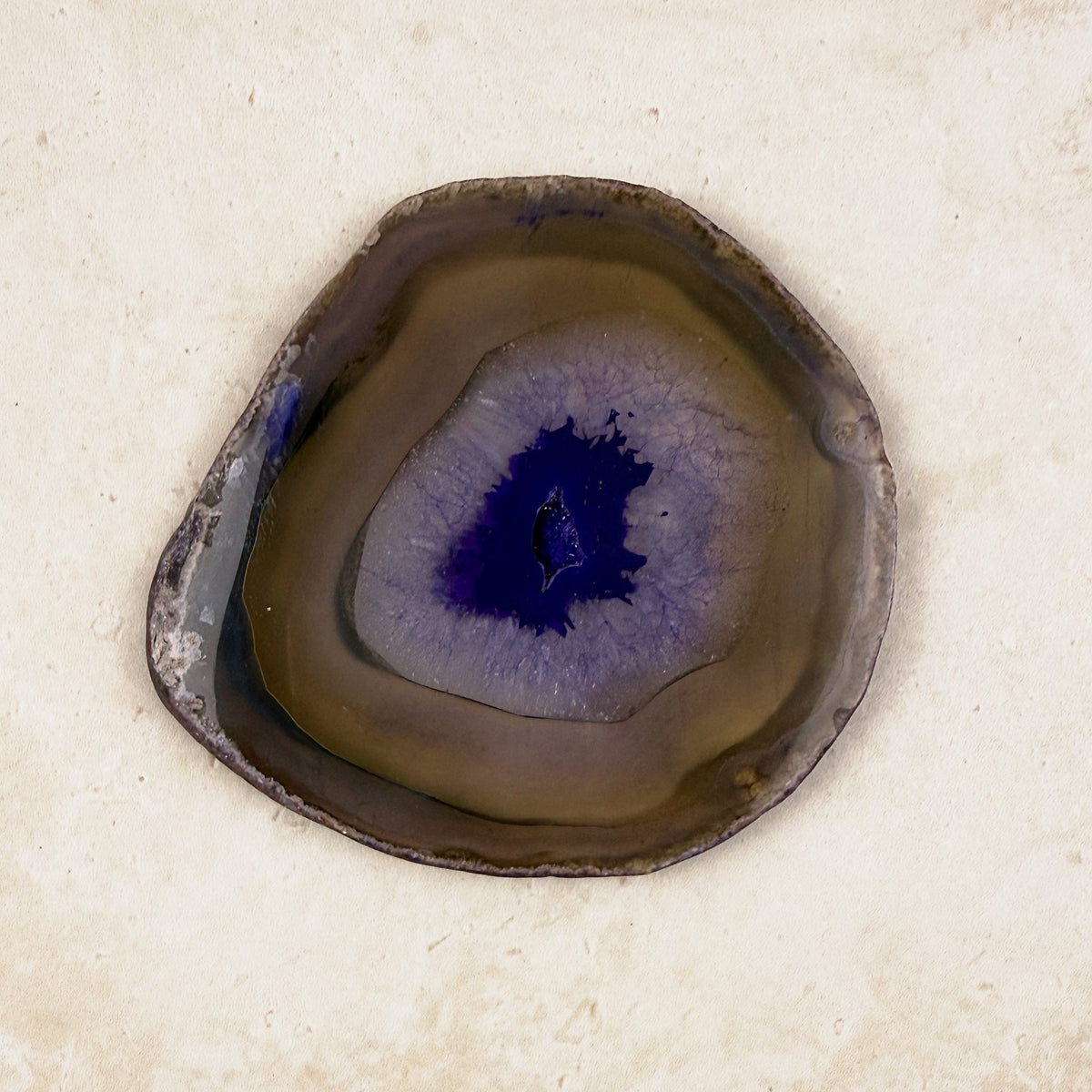 Dyed purple agate crystal slice 10cm, purple centre within olive and brown bands, from above — Eternal Spirit