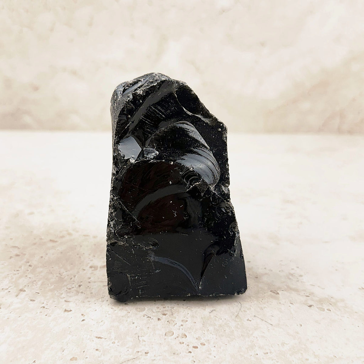 Flecked black obsidian rough 10cm, jet black standing piece, front view — Eternal Spirit