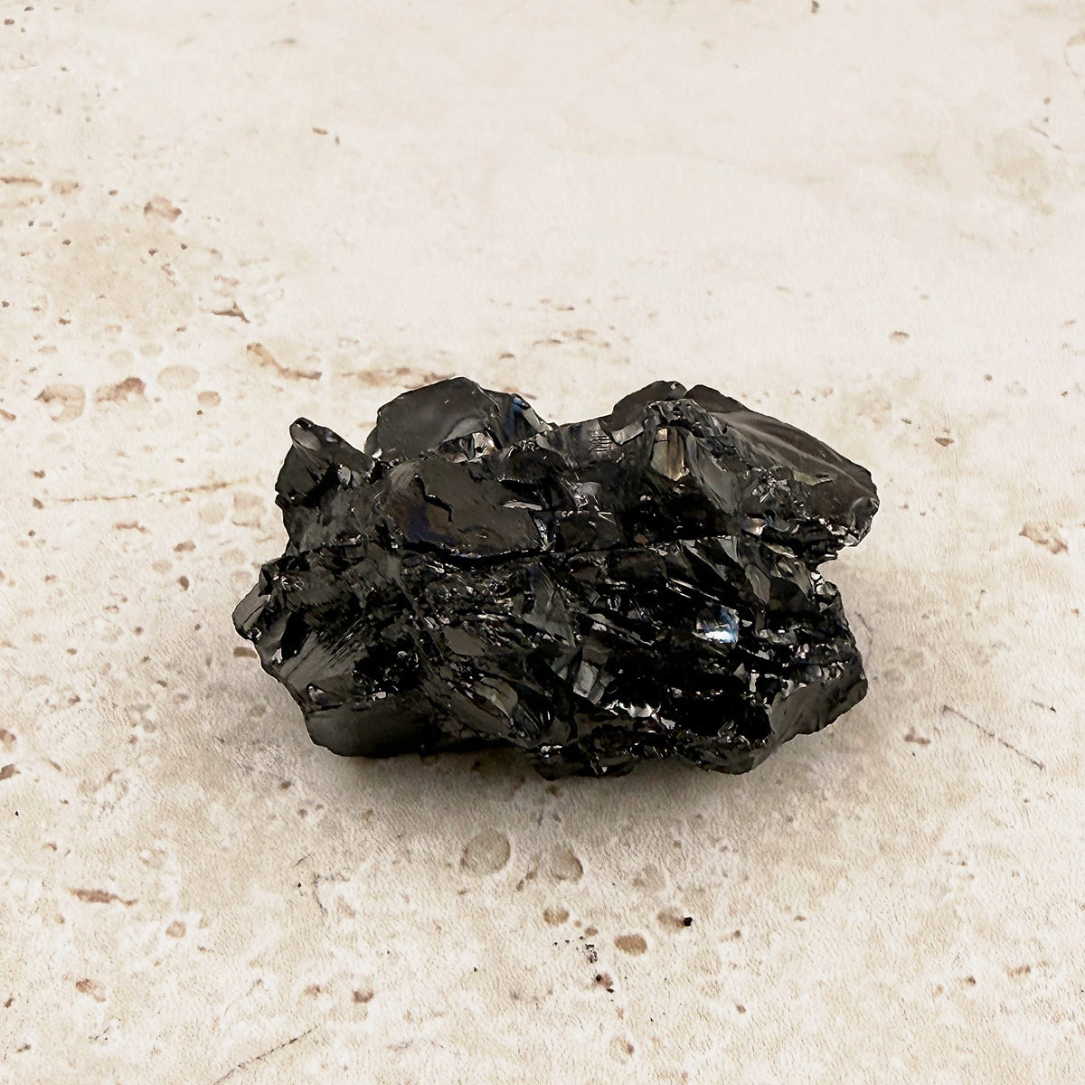 Glossy elite shungite rough crystal 5cm, angular black piece seen from the side — Eternal Spirit