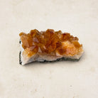 Heated citrine crystal cluster 7.5cm, amber points along a white quartz base, side view — Eternal Spirit