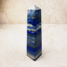 Lapis lazuli crystal obelisk 13.5cm, deep blue with pale bands, standing upright, other face — Eternal Spirit