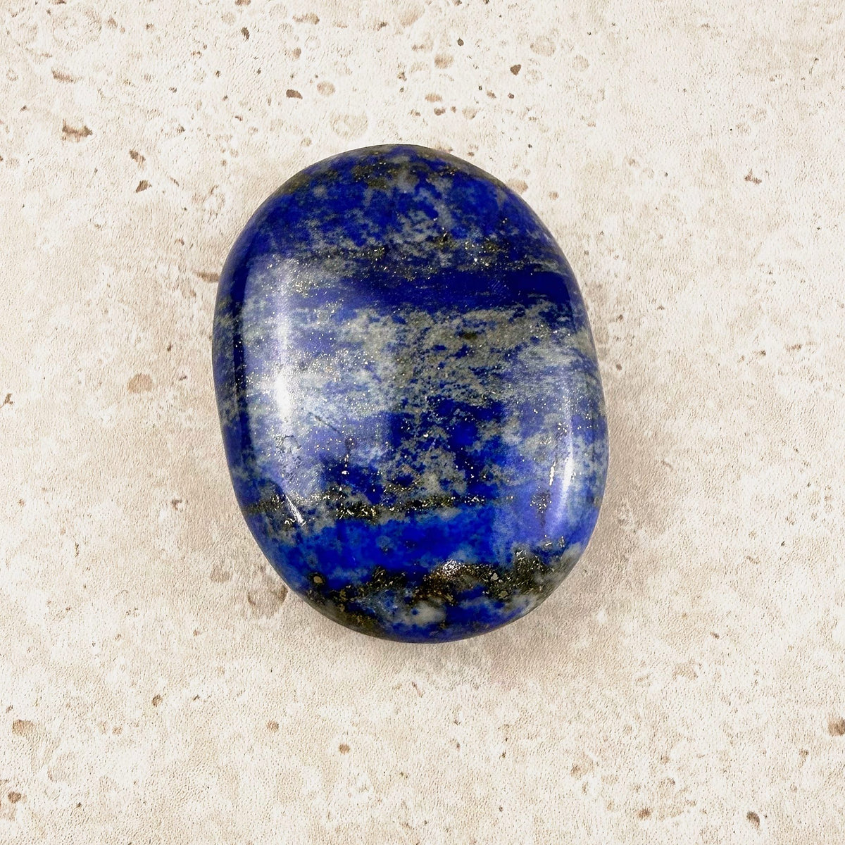 Lapis lazuli crystal soap stone 5cm, glossy blue oval, lengthways view — Eternal Spirit