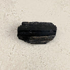 Rough black tourmaline crystal 8.5cm, long rectangular log, front view — Eternal Spirit