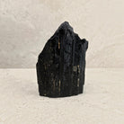 Rough black tourmaline crystal 15cm, sloping peak, front view — Eternal Spirit