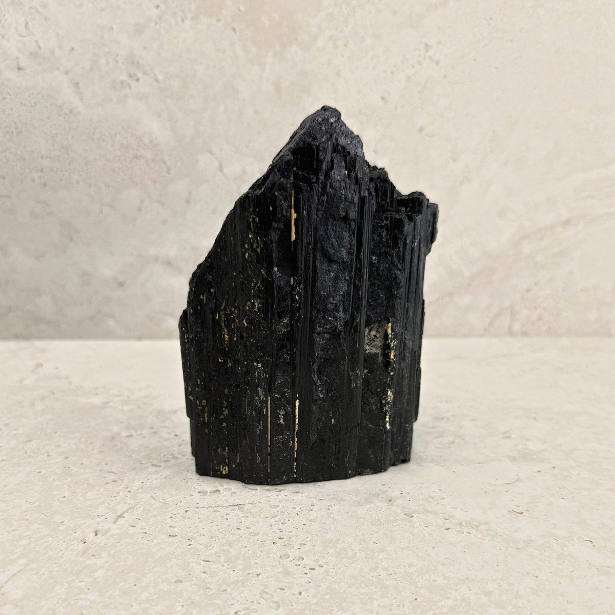 Rough black tourmaline crystal 15cm, sloping peak, front view — Eternal Spirit