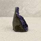 Base cut amethyst crystal 12cm, tall arch, angled side view — Eternal Spirit
