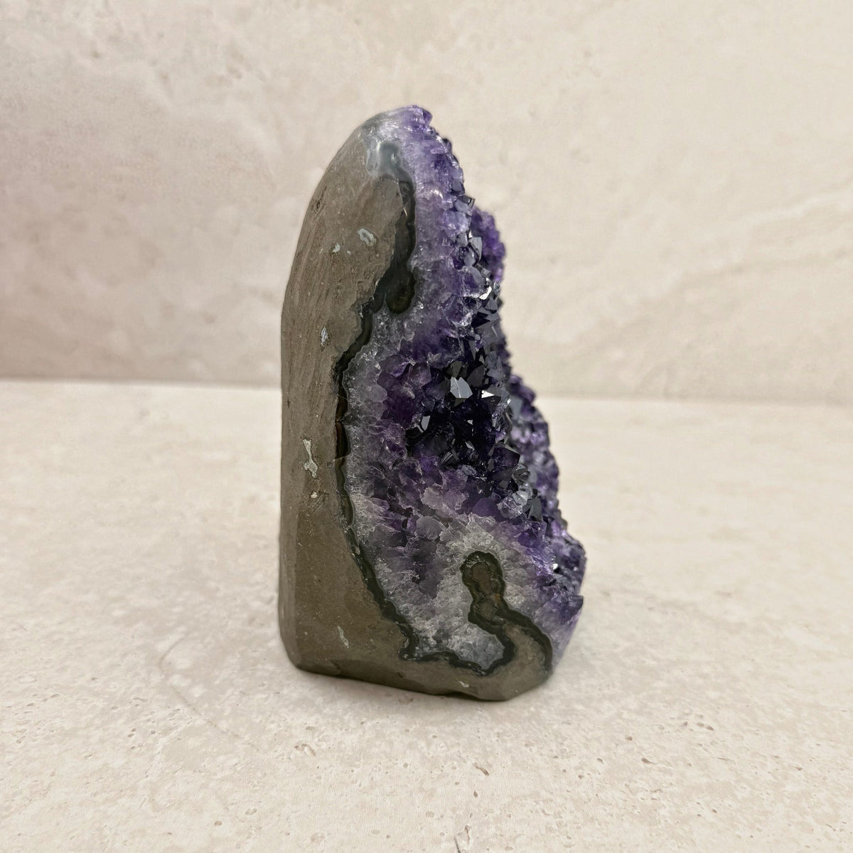 Base cut amethyst crystal 15cm, swirled grey and white banding on the shell, side view — Eternal Spirit