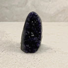 Base cut amethyst crystal 8.5cm, slim oval of dark purple crystals, front view — Eternal Spirit