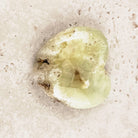 Prehnite crystal heart 5.5cm, soft lime green and translucent, viewed from above — Eternal Spirit