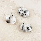 Rainbow moonstone crystal palm stones 4.5cm, three shown, milky white with dark flecks — Eternal Spirit