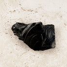 Rippled elite shungite rough crystal 7cm, shell-like ripples on glassy black faces — Eternal Spirit