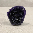 Base cut amethyst crystal 6.5cm, round flat slice of dark purple crystals, front view — Eternal Spirit