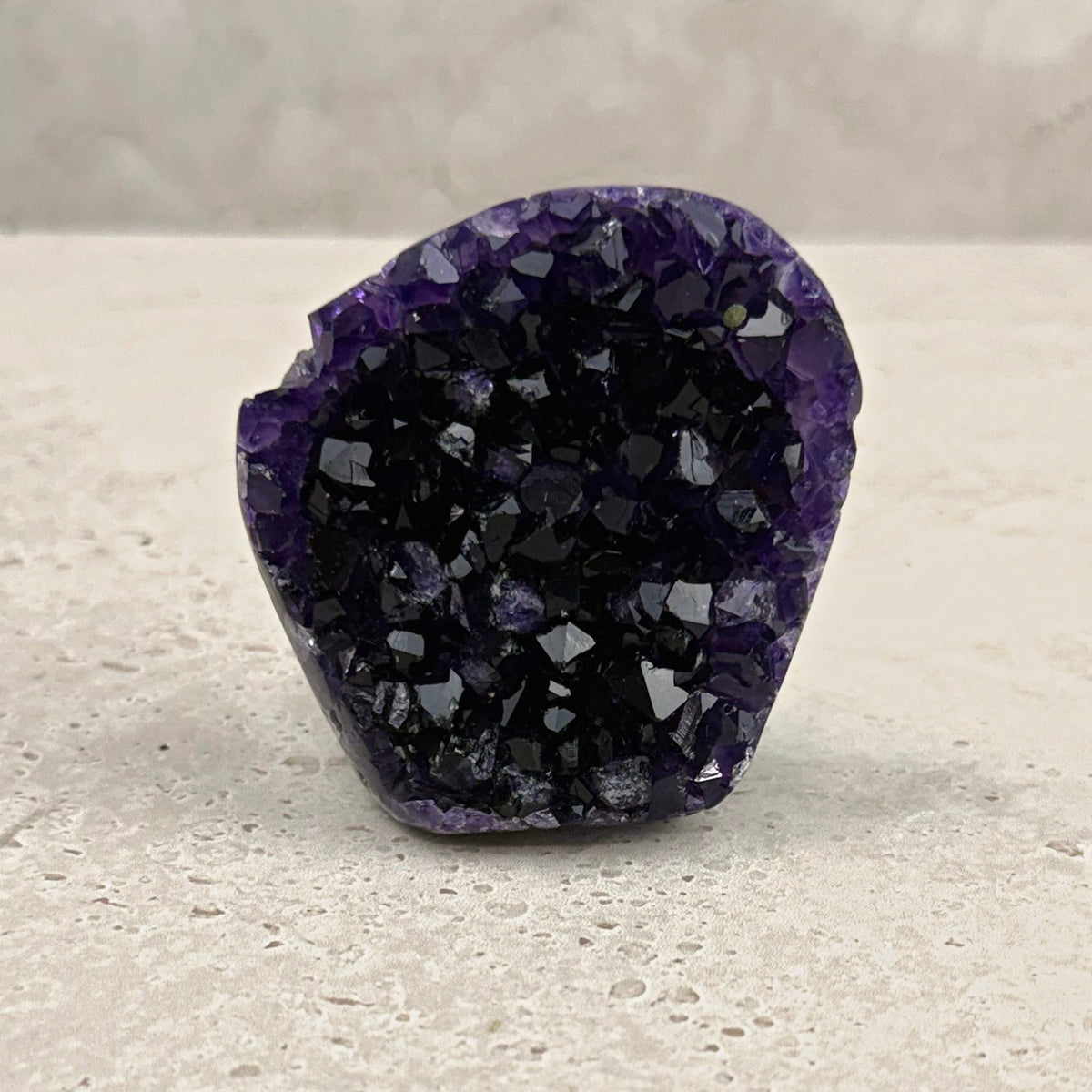 Base cut amethyst crystal 6.5cm, round flat slice of dark purple crystals, front view — Eternal Spirit