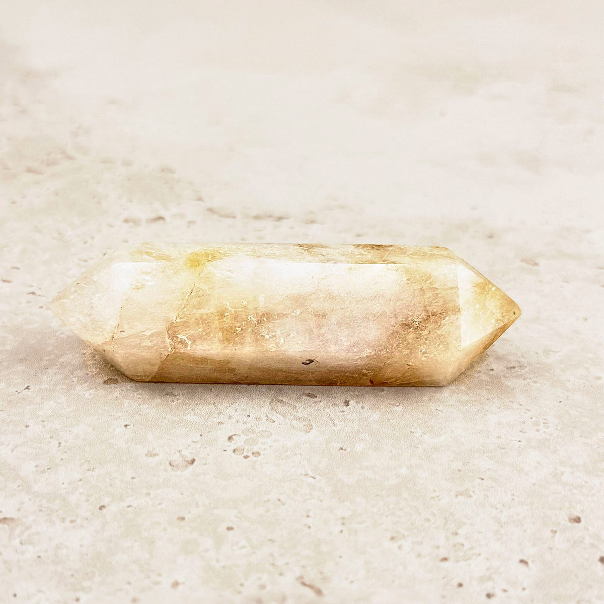 Slender heated citrine crystal wand 8.5cm, its paler milky white side, double-pointed — Eternal Spirit