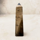 Smoky quartz crystal obelisk 11.5cm, clear brown with dark inclusions, standing upright — Eternal Spirit