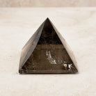 Smoky quartz crystal pyramid 6.5cm, smoky brown with a clear patch near the base, other face — Eternal Spirit