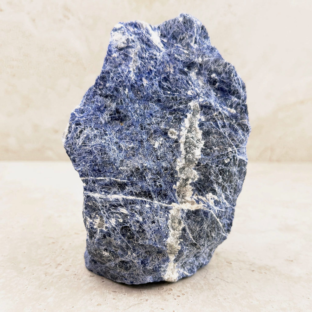 Sodalite rough crystal 16cm, royal blue with crisp white veins, standing upright, front view — Eternal Spirit