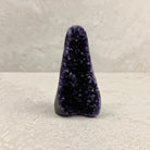 Base cut amethyst crystal 12cm, tall tapered spire of purple crystals, front view — Eternal Spirit